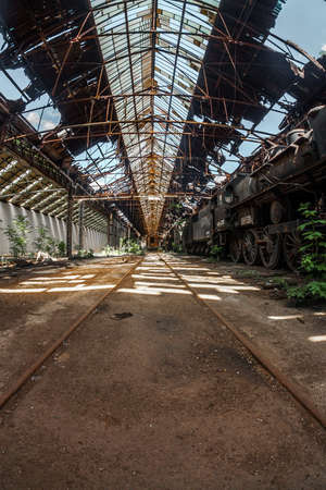 Old trains at abandoned train depotの写真素材