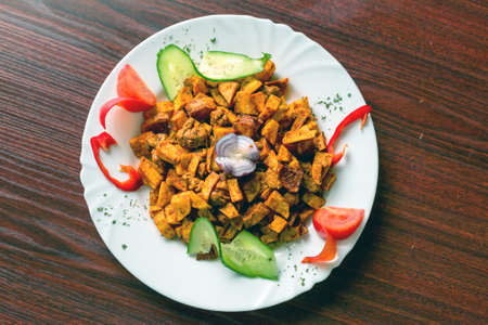 Delicious food on white plate close upの写真素材