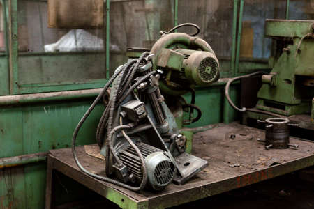 The image of an used engine in empty factoryの写真素材