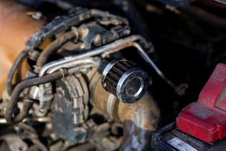 Man repairing motor block of a carの写真素材