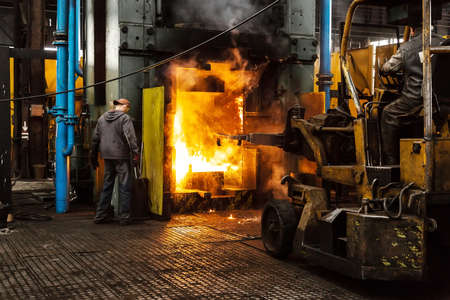 Hard work in a factory close upの写真素材