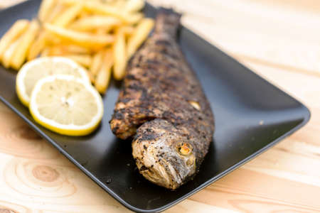 Fish and chips with lemonの写真素材