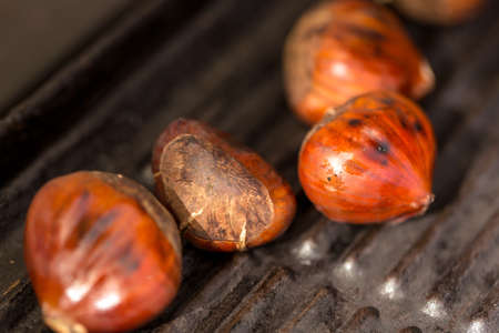 Delicious roasted chestnuts close upの写真素材