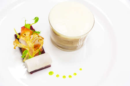 Gourmet dessert on white plate closeupの写真素材
