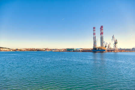 Port warehouse with cargoes and containersの写真素材