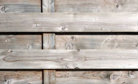 Part of a weathered wooden fence, excellent backgroundの写真素材