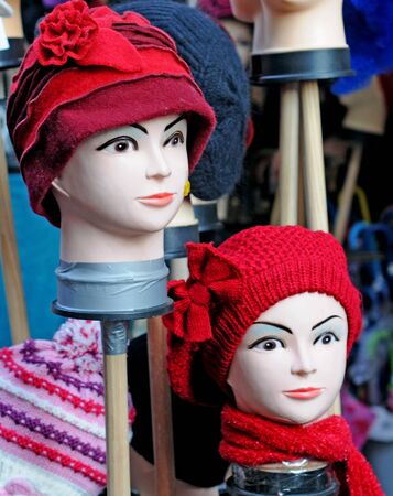 Dummy heads showing hats, shallow depth of fieldの写真素材