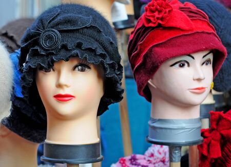 Dummy heads showing hats, shallow depth of fieldの写真素材