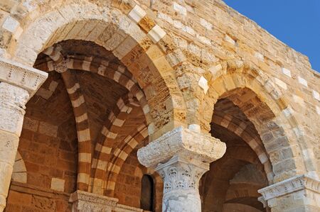 Ancient ornate arab arches in Brindisi, Puglia, Italyの写真素材