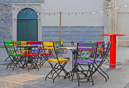Attractive, colorful outdoor or sidewalk cafe in closing timeの写真素材