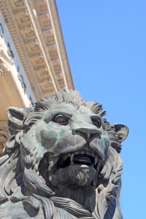 Detail of bronze lion guarding the parliament or congreso de los diputados in Madrid, Spain, Europeの写真素材