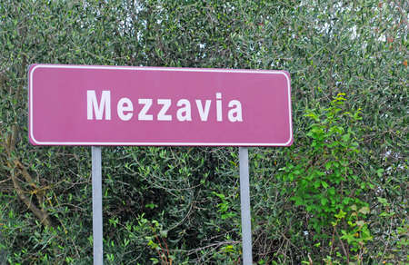 road sign mezzavia or halfwayの写真素材
