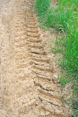 tractor track in clay groundの写真素材