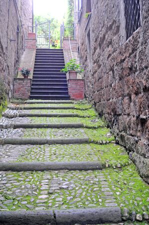 street view with stairs in orvieto, umbria, italyの写真素材