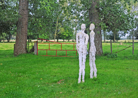 BRUGES, BELGIUM â AUGUST 27, 2014: Art by Ann Vrielinck in the annual open air exhibition Lissewege, Sculptures in the White Village. Over 100 sculptors of contemporary art exhibit in this 20th editionのeditorial素材