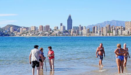 BENIDORM, SPAIN - NOVEMBER 6, 2014: Elderly people from all over Europe spend the colder season in Benidorm enjoying the sunny microclimate and the healthy seawaterのeditorial素材