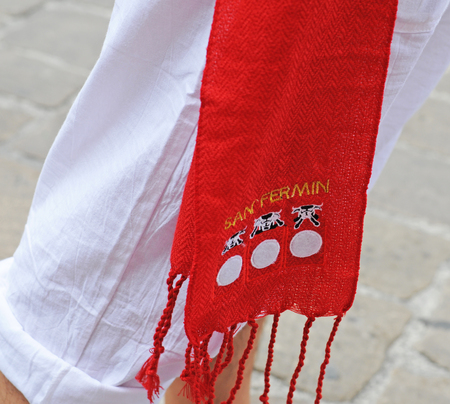 PAMPLONA, SPAIN - JULY 8, 2015: During the famous traditional annual feast of San Fermin, July 6 to 14, all inhabitants and most visitors are dressed in the city colours red and whiteのeditorial素材