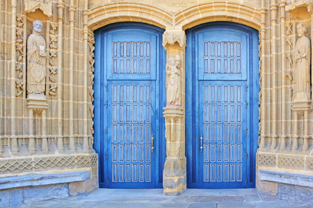 double blue church doors in guernica, basque country, spainの写真素材