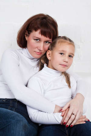 mother and the daughter embraceの写真素材
