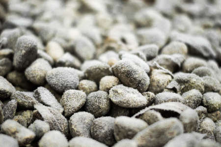 background of stones in frost the beginning of spring