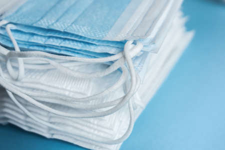 stack of surgical face masks, background