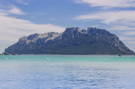 small island Tavolara near the northeastern shore of Sardinia in the Tyrrenian sea.view from the beachの写真素材