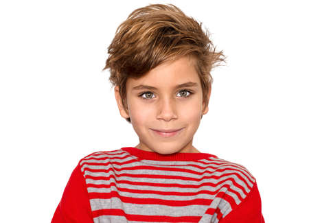 cute boy with blonde hair slmiles isolated on white background