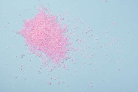 skin care and massage. Bath rose salt on blu background.Spa and natural skin care conceptの写真素材