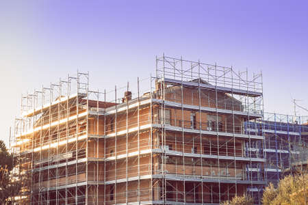 Construction and decoration of scaffolds of the building. Scaffolding old buildingの写真素材