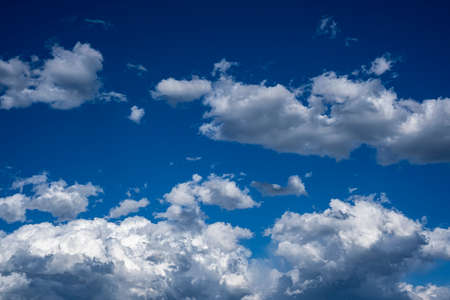 White and gray clouds in the blue sky background