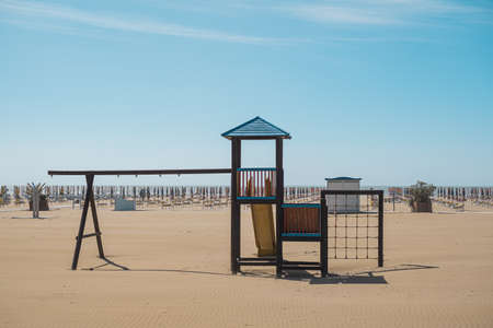 Children playground on public beach. Slide and climbing frames.の写真素材