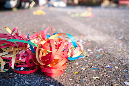 Colorful confetti and streamers at the street after Carnival showの写真素材