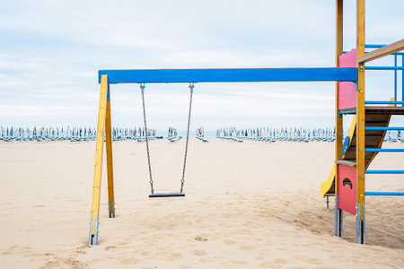 Children playground on public beach. Slide and climbing frames.の写真素材