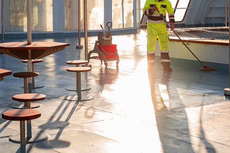 Cleaning and mopping floors on a cruise shipの写真素材