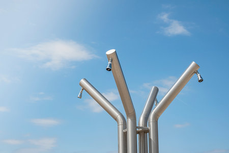 Outdoor public showers on the beach in Italy, summer holiday conceptの写真素材