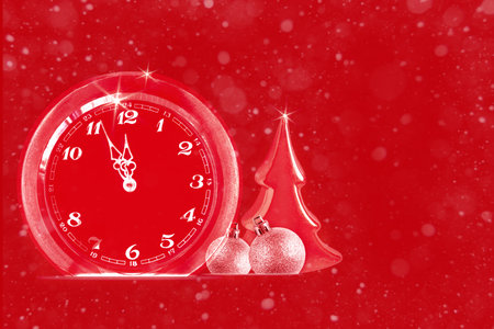 Abstract red greeting card with clock, Christmas tree and silver balls, counting last moments to New...