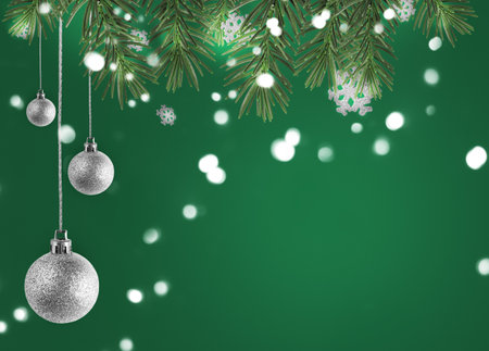 Abstract greeting card with Christmas tree branches, snowflakes and silver balls.の写真素材