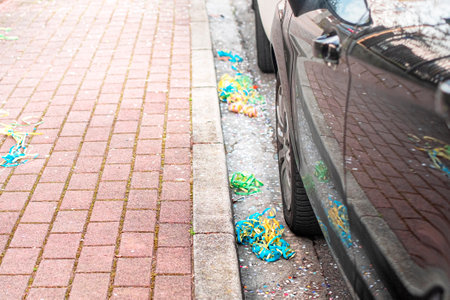 Colorful confetti and streamers at the street after Carnival showの写真素材