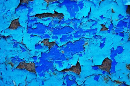 Old cracked paint pattern on rusty background.の写真素材