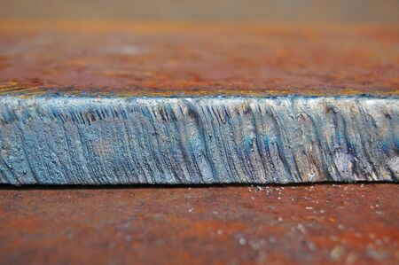 Metal plate cut-off, line, rusty background, metal texture