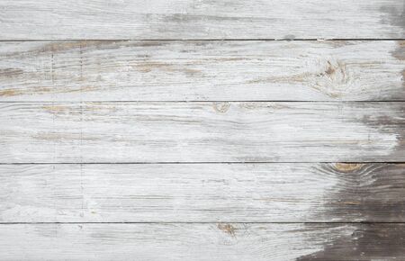 white old wooden fence. wood palisade background. planks textureの写真素材