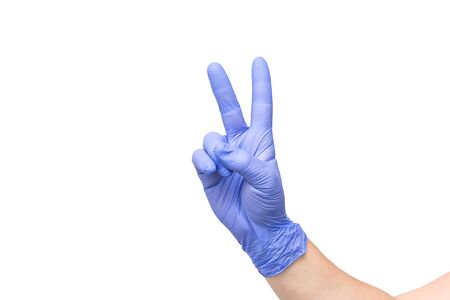 male hand on white background showing the symbol of victory or number two or sexual insultの写真素材