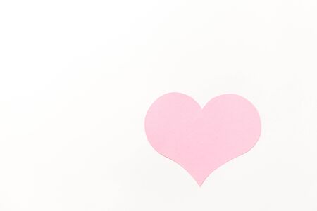 a large pink heart with a place for text on a white background, symbol of loveの写真素材
