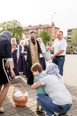 Beryoza, Belarus - April 27, 2019: The priest follows the Christian religious tradition of...