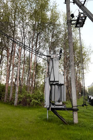 AC high-voltage power transformer. Electrical energy transfer to end users through distribution...
