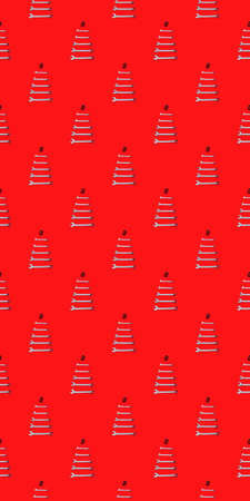 Seamless texture with Christmas trees made of wrenches decorated with balls on a red background. Happy New Year pattern. Banner with tools. Wallpaper. Industrial holiday concept. Calendar template.の写真素材