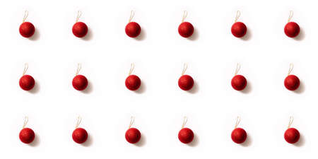 Seamless pattern with red and golden Christmas toy balls on a white background. Christmas texture....