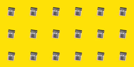 Seamless pattern with a large silver calculators on yellow background. Financial banner. Mockup design texture. Business card. Copy space. Concept of accounting, profit, loss, tax. Digital stationery.の写真素材
