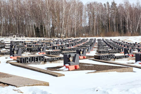Khatyn, Belarus - March 13, 2021 Village cemetery memorial complex. Victims of the Second World War. Symbol of the mass destruction of civilians by the Nazis. Visitors. spring season. March.のeditorial素材