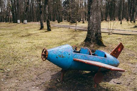 Retro plane on the playground of the times of the USSR. Vintage object for children games of Soviet preschoolers. equipment and simulators of game activities. childhood memories. history. circa 1960.の写真素材